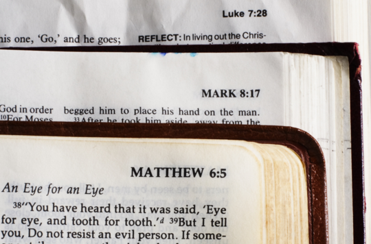 Three Bibles showing the Gospels of Matthew, Mark and Luke