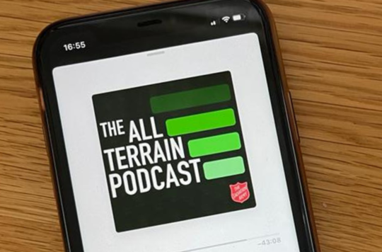 The All Terrain Podcast being played on a phone