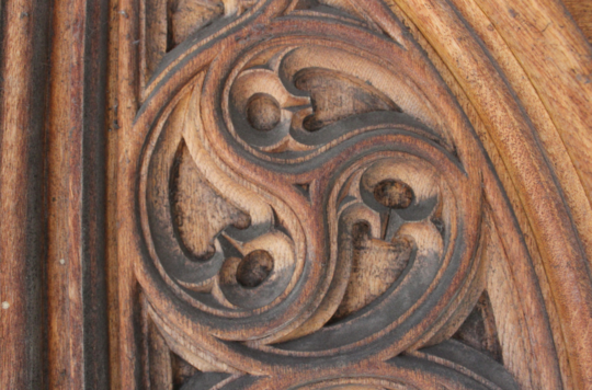 A carving of a Trinitarian shape