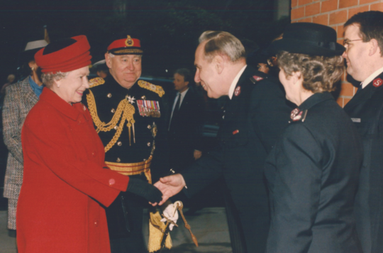 The Queen shaking hands with Salvation Army officers