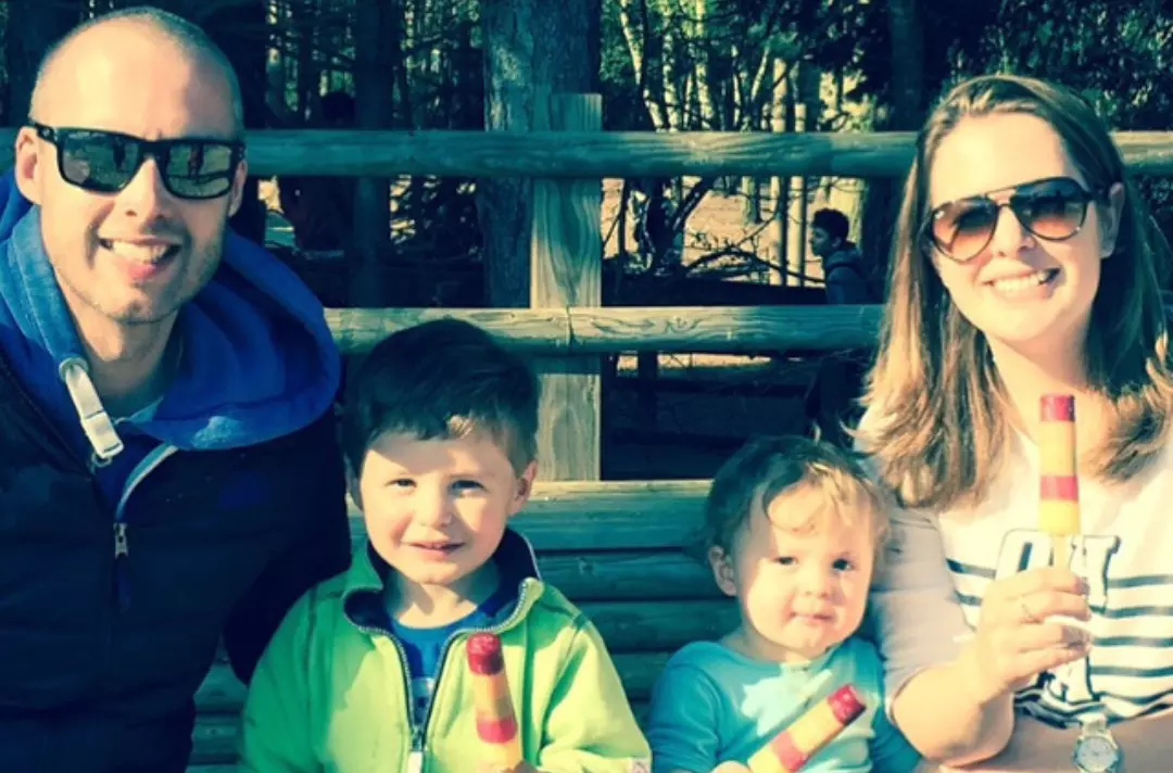 Louise Blyth eating ice lollies with her husband and children