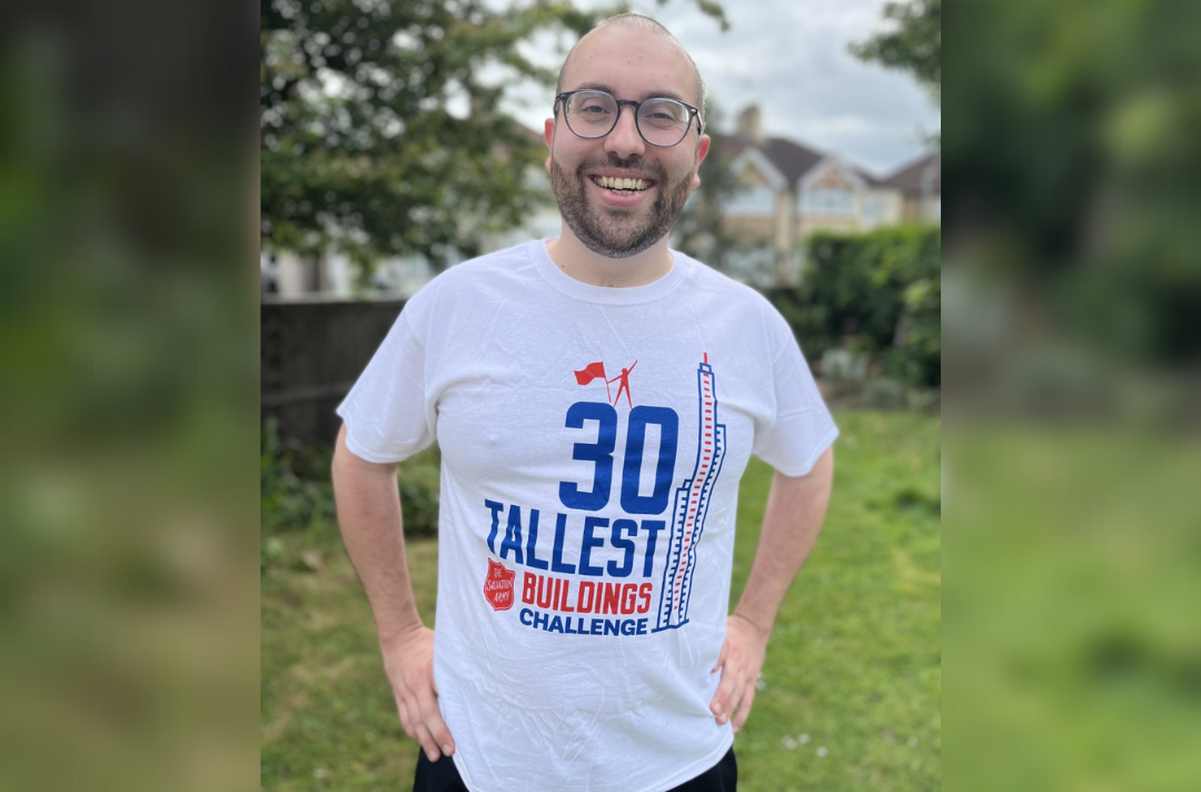 Captain Mark Scoulding wearing his 30 Tallest Buildings Challenge t-shirt