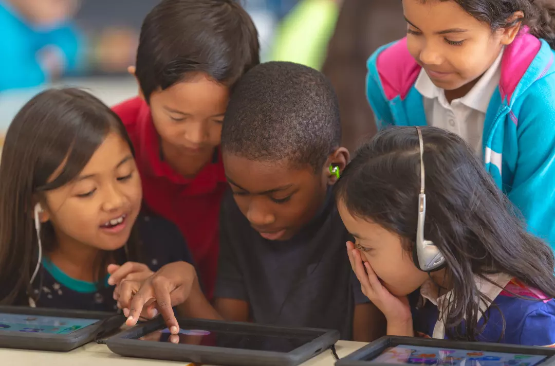 Children playing on a tablet