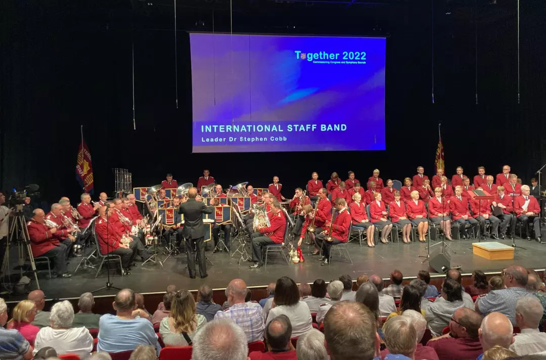 The International Staff Band and International Staff Songsters on the stage