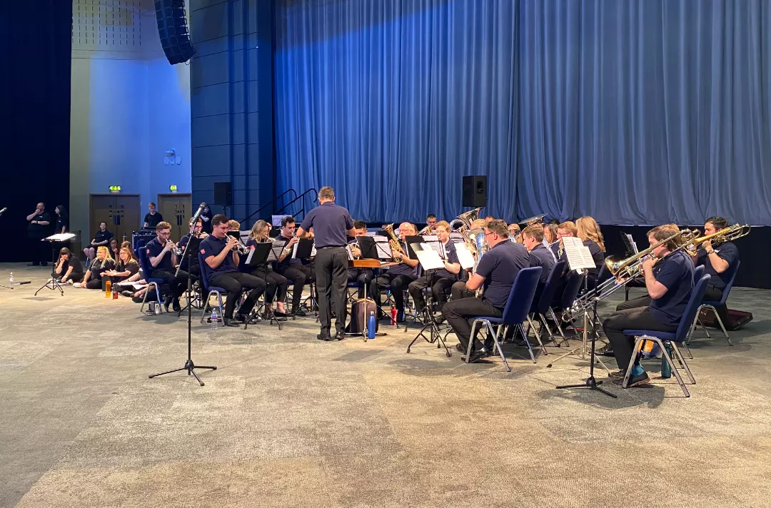 A youth brass band playing