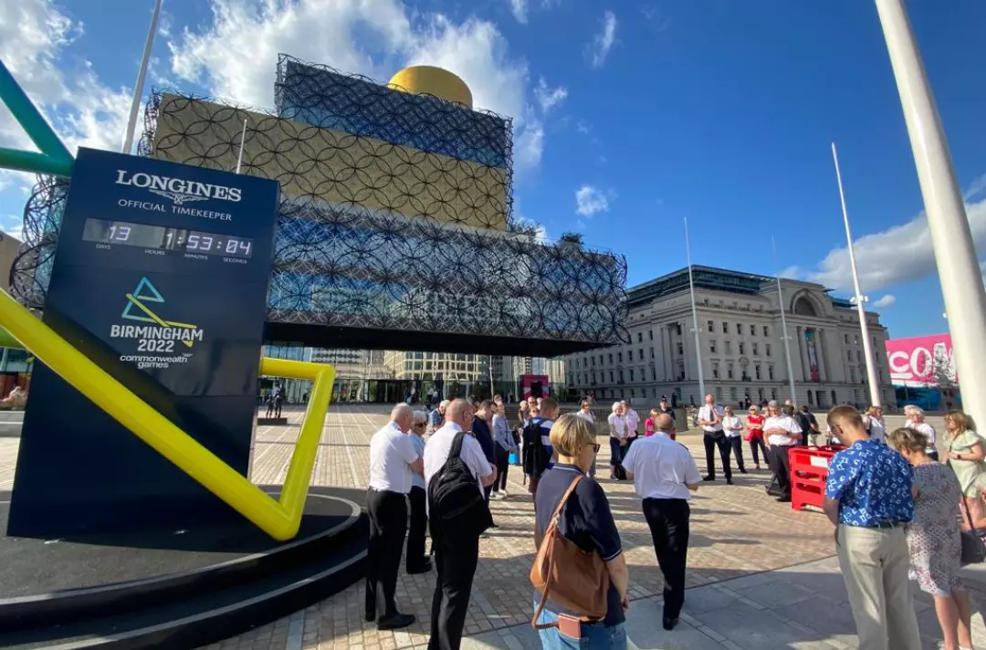 People standing around the Birmingham Commonwealth Games countdown timer