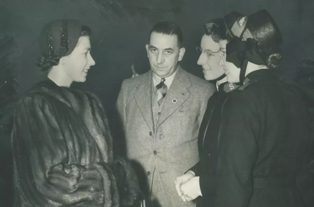 The Queen Elizabeth II talking to Salvationists wearing bonnets