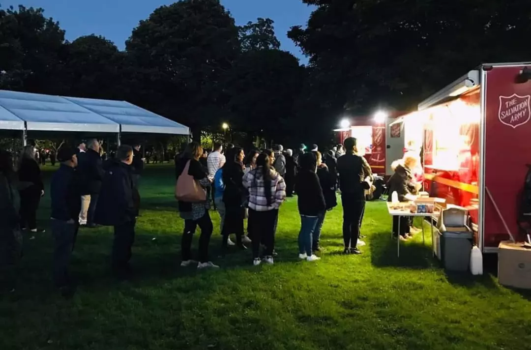 Queues for refreshments from two Salvation Army response units