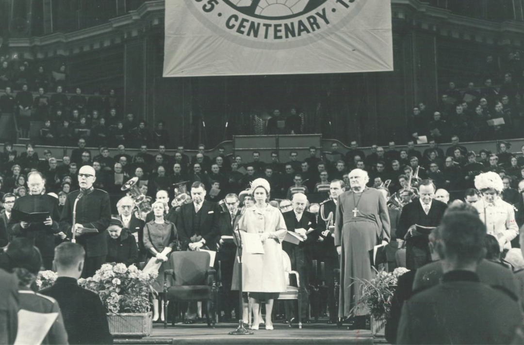 The Queen on the stage of the Royal Albert Hall with Salvation Army leaders