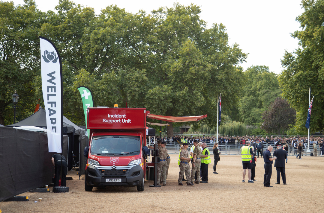 A Salvation Army incident support unit with military personnel receiving refreshments on Horse Guards Parade