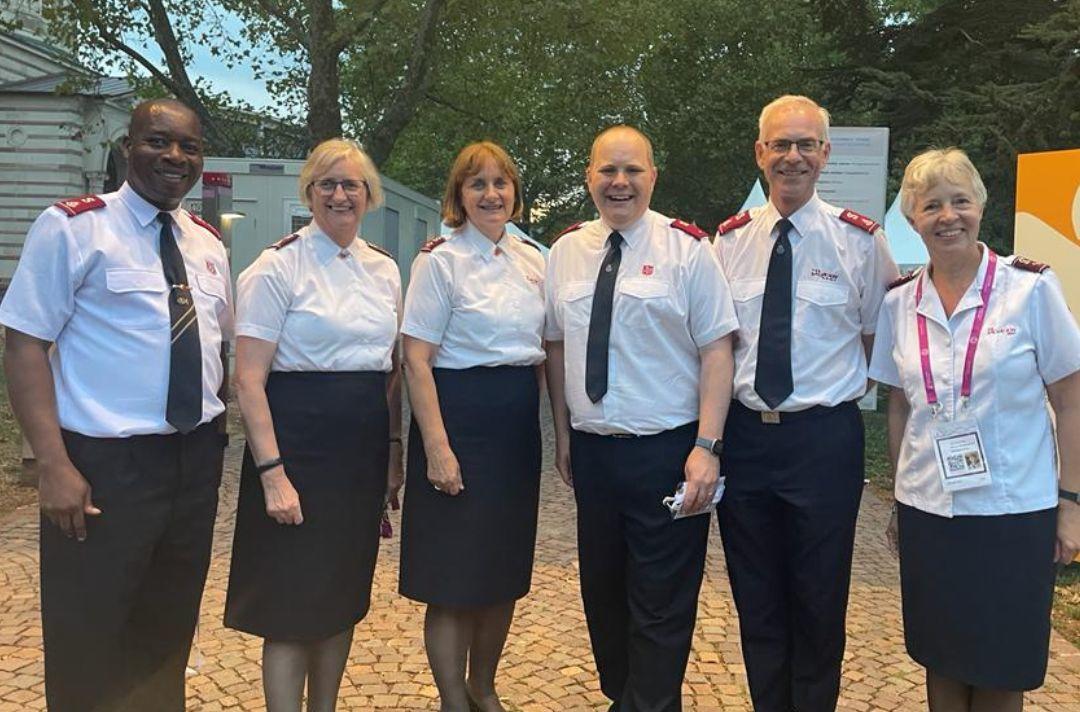 A group of six people wearing Salvation Army uniform