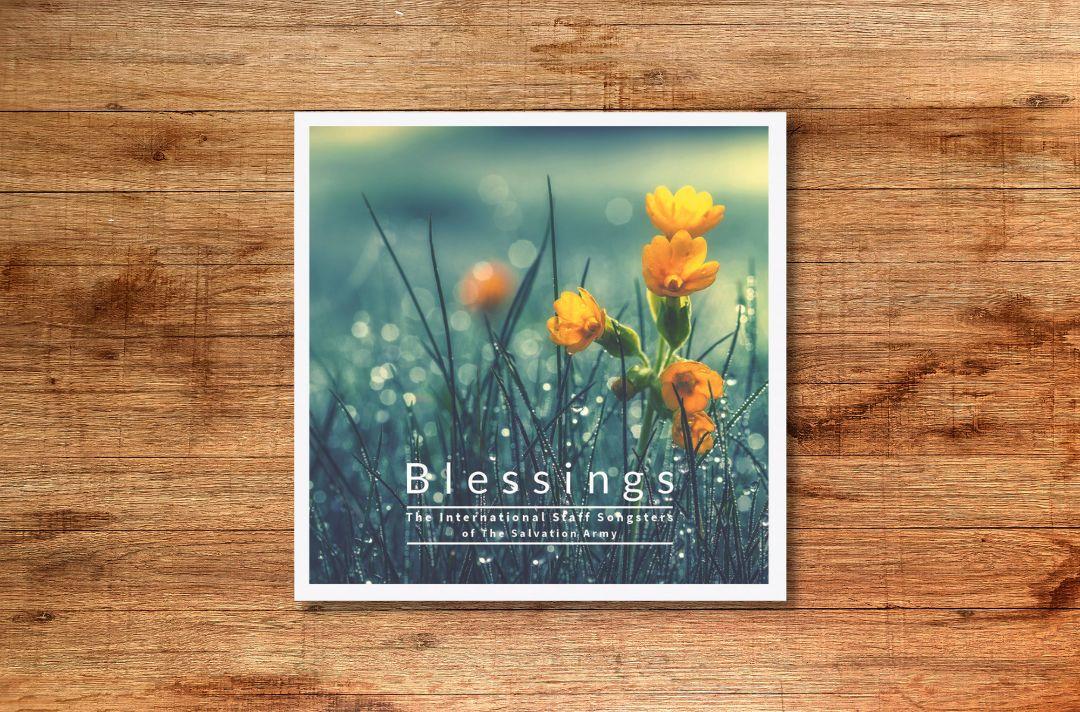A photo of the Blessings album cover featuring flowers
