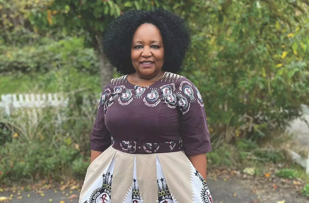 A photo of Joyce Chimkupete wearing traditional African Salvation Army fabric