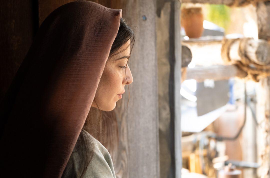 A photo from the TV series of Mary Magdalene looking out of a window
