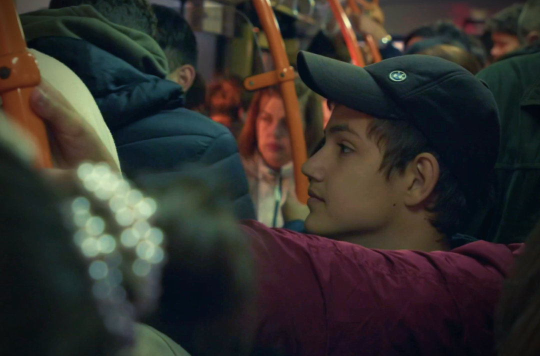 Photo shows Dmitry on a packed bus.