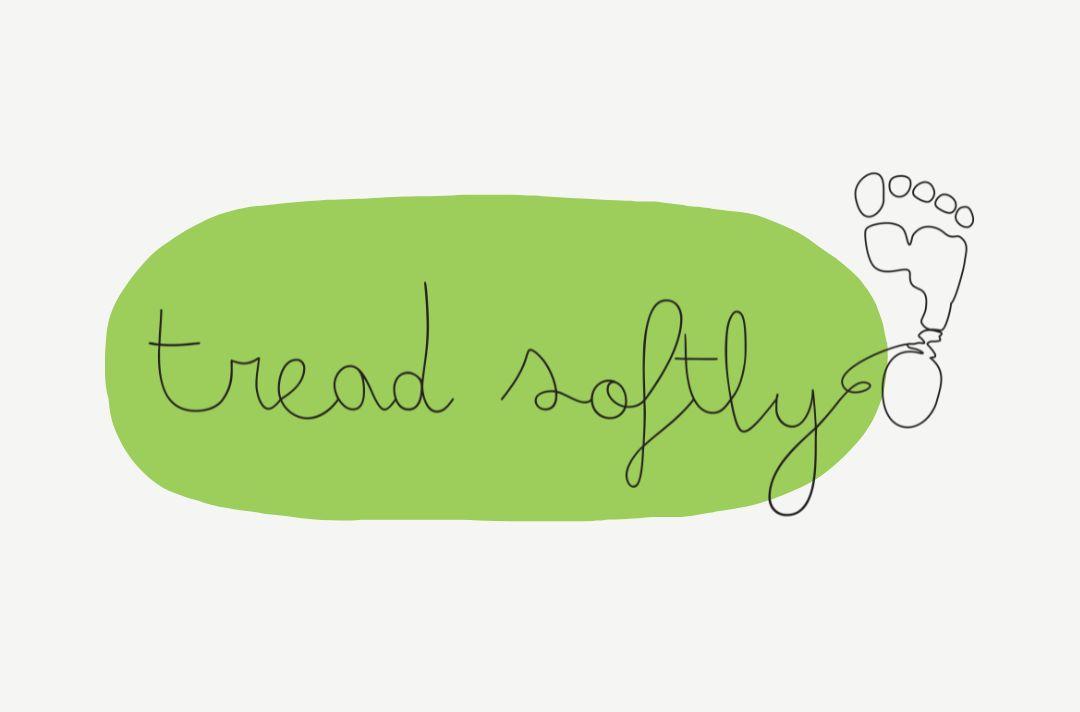 The words 'tread softly' in a handwriting font joined up with a drawing of a footprint
