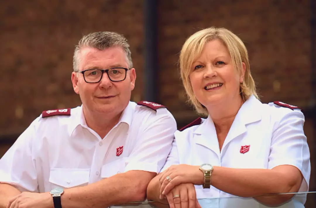 Photo shows Majors Mark and Andrea Sawyer