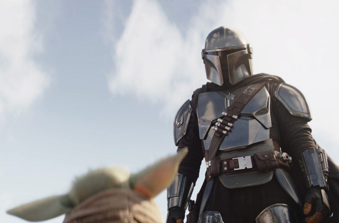 Grogu and Din Djarin (Pedro Pascal) in Lucasfilm’s ‘The Mandalorian’, Season 3, exclusively on Disney+.