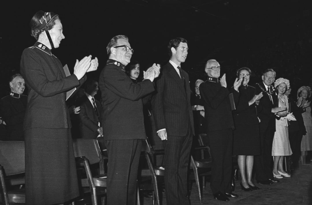 1978 – International Congress, 30 June Prince Charles, flanked by General Arnold Brown and Chief of the Staff Commissioner Stanley Cottrill received the applause of Salvationists at the opening of the International Congress at Wembley Arena.