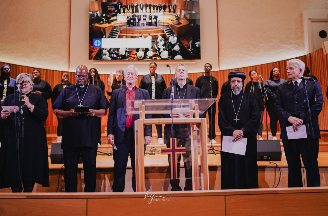 Photo shows representatives of different churches praying on a platform. Picture: Sarah Mensah.