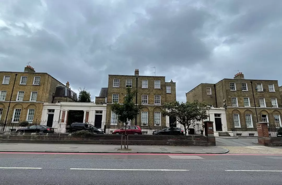 A colour photo of the old Mothers Hospital in 2023 - The Salvation Army signage has been removed and there are cars parks outside