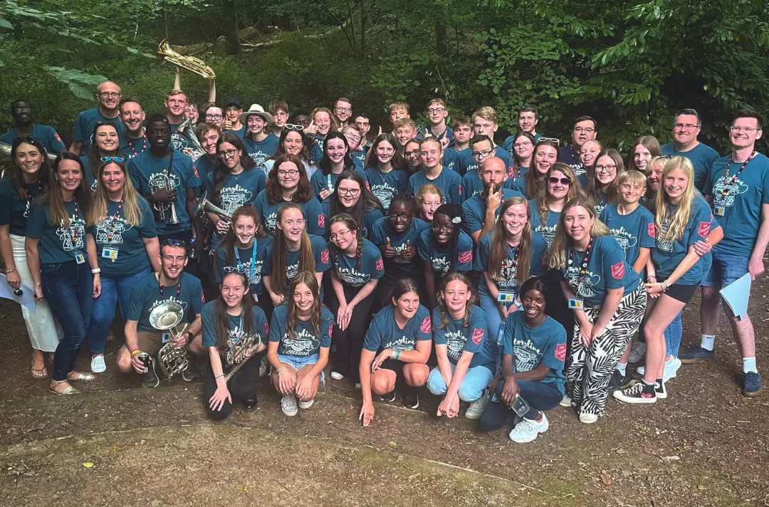 A group photo shows students of the East of England Youth Summer School.