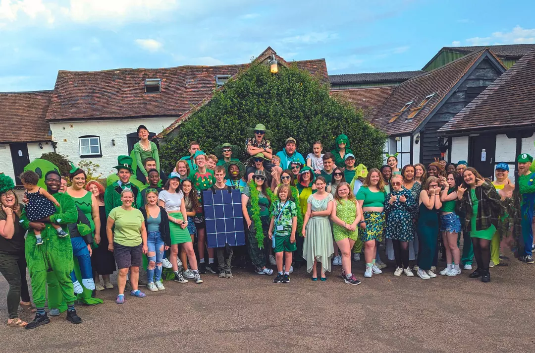 A group photo shows students of the South West summer school.