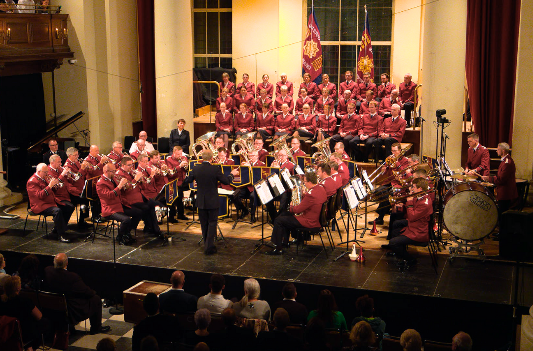 A photo of the International Staff Band and the International Staff Songsters in concert at St John’s Smith Square, London.