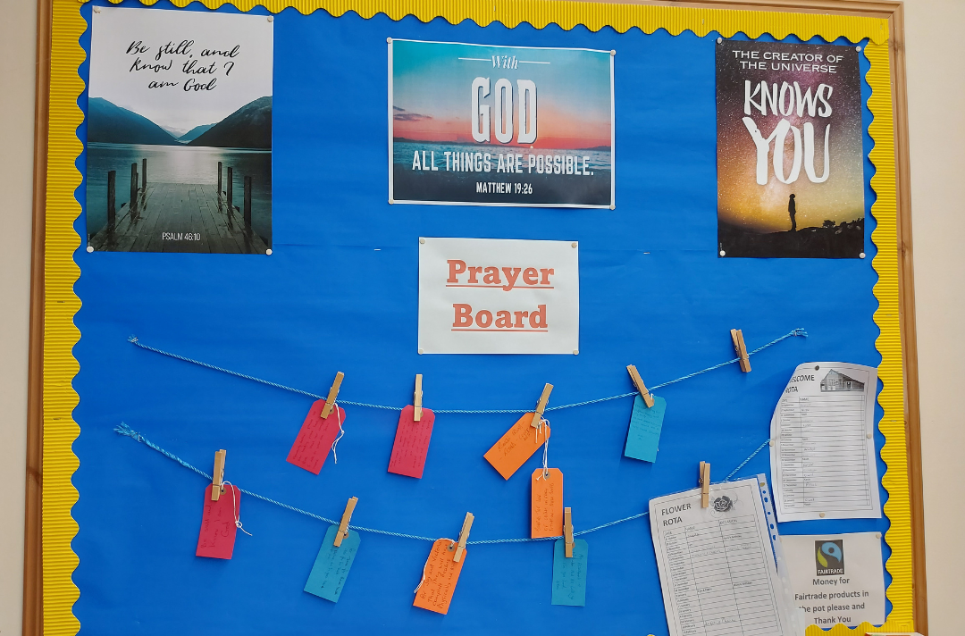 A photo shows a prayer board at Beccles Corps.