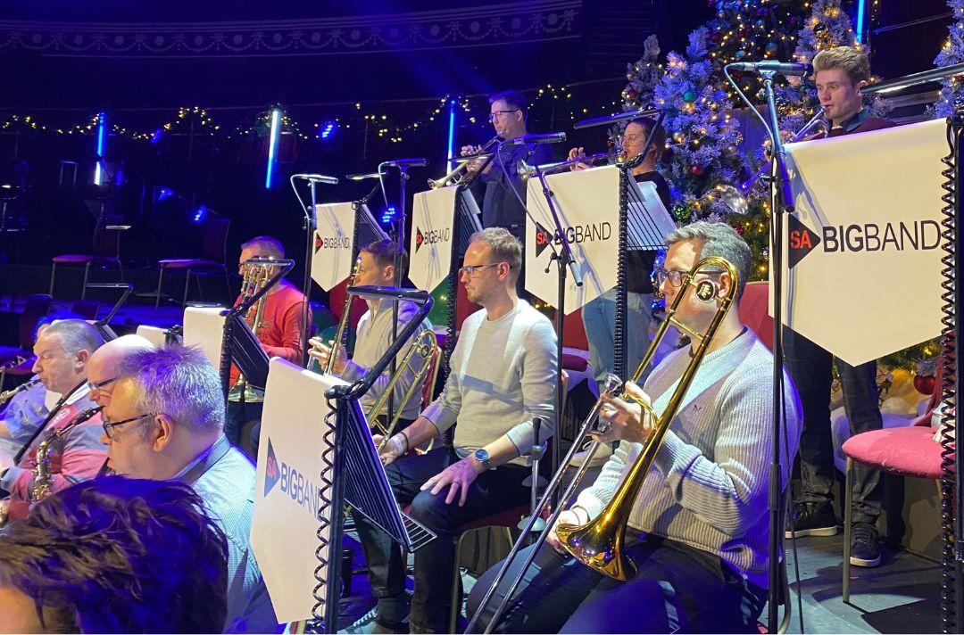 A photo of the SA big band rehearsing on stage at the Royal Albert Hall