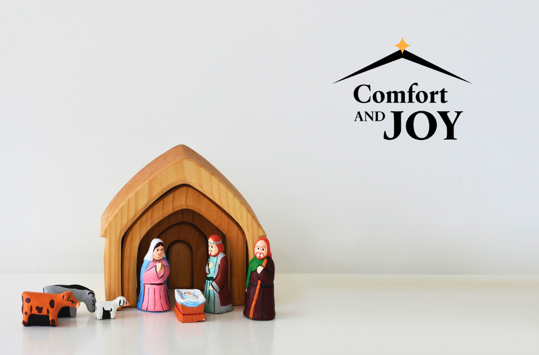 A photo shows a wooden manger scene with a baby Jesus, Mary, Joseph, shepherd and animal figures. Text reads: Comfort and joy.