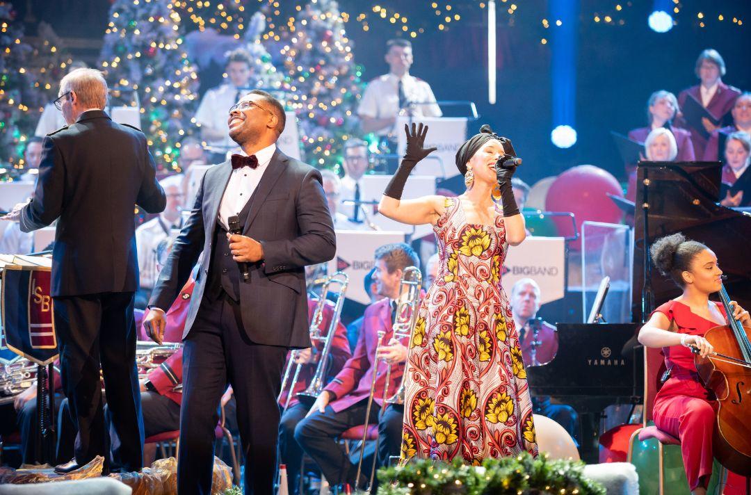 A photo of Andrew Kisumba and family performing on stage at the Royal Albert Hall