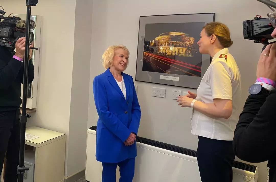 A photo of Major Jo Moir filming and interview with Rosemary Conley