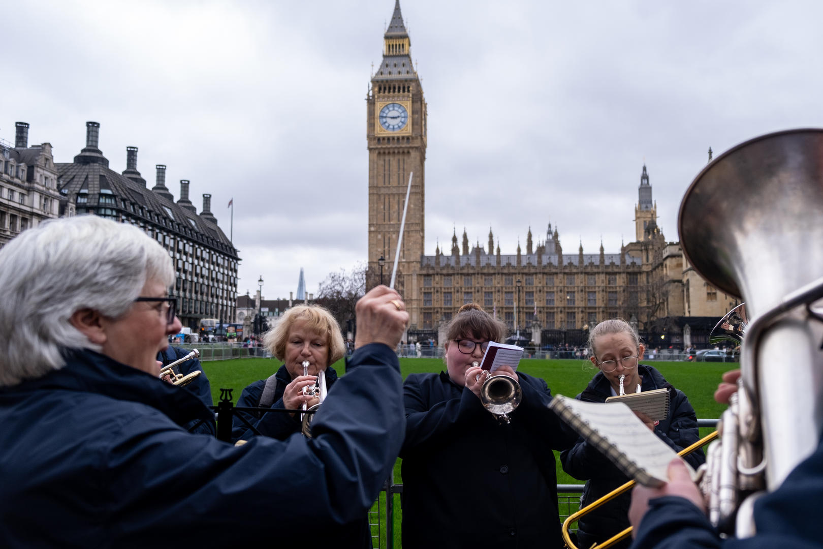 A photo of a brass band playing at the vigil