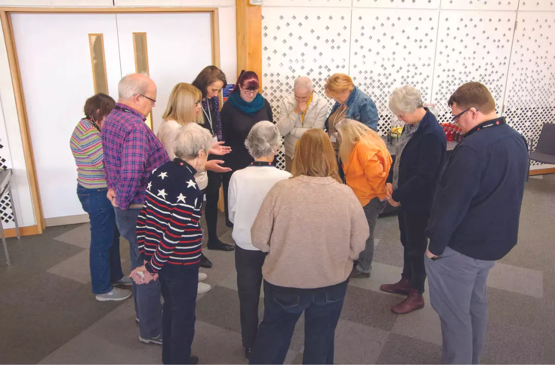 People praying at the Encounter Prayer Gathering