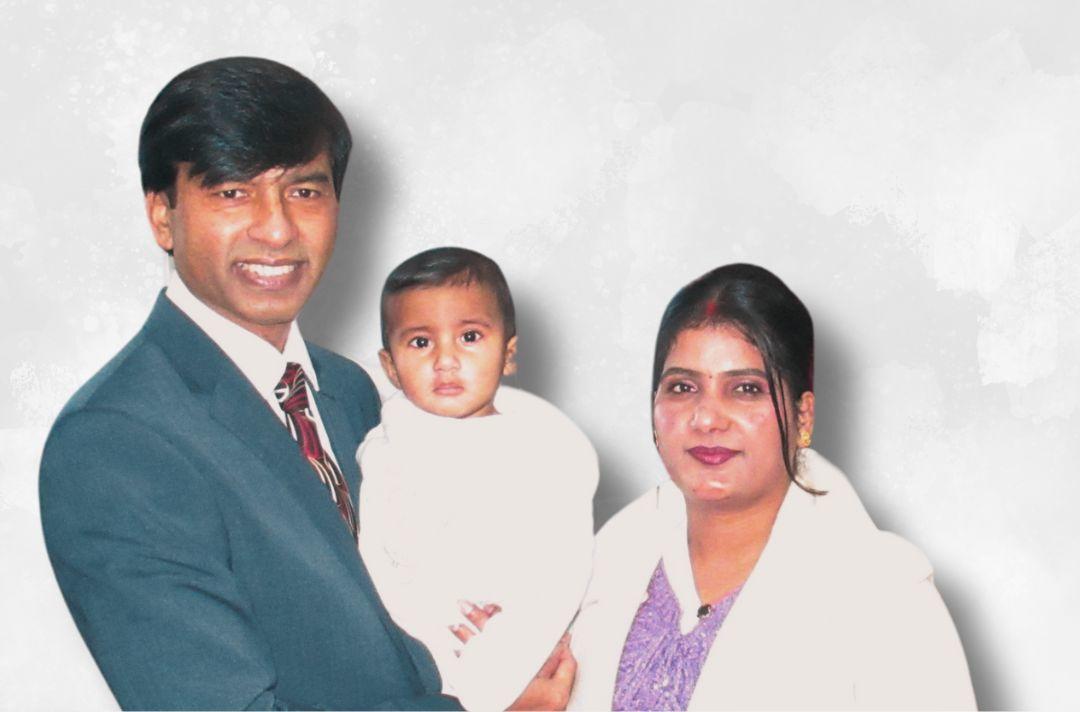 Surender and Razia Surender Singh holding their baby son, Saron