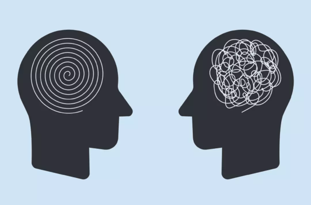 An image of two silhouette faces looking at each other