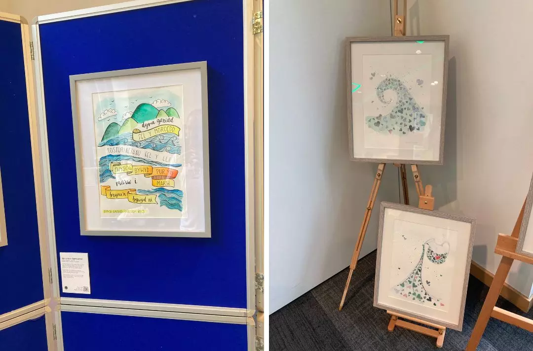 A photo of works of framed art in the Together art gallery