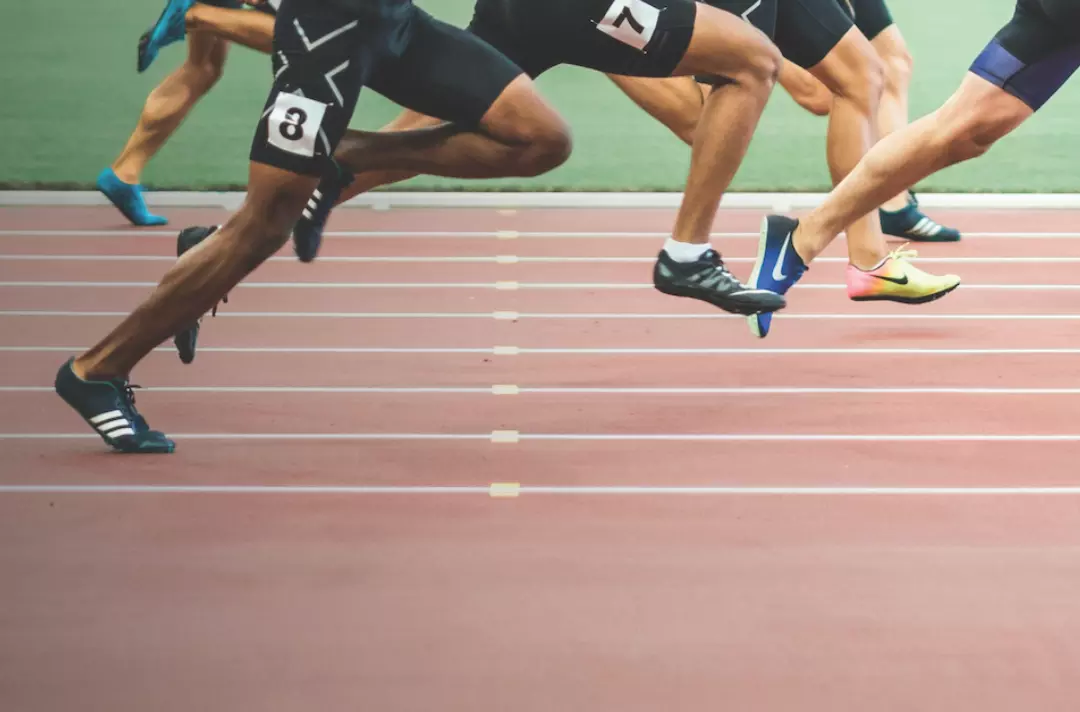 A photo of men running a race