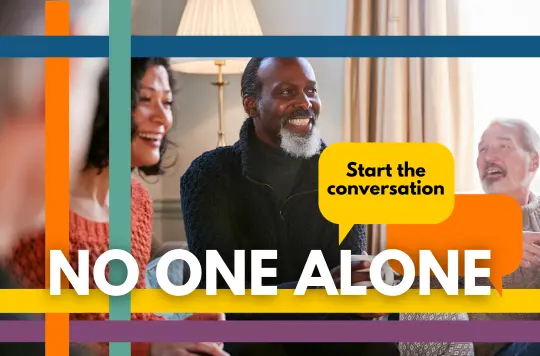 A group of people laughing with text 'No One Alone' and colourful lines