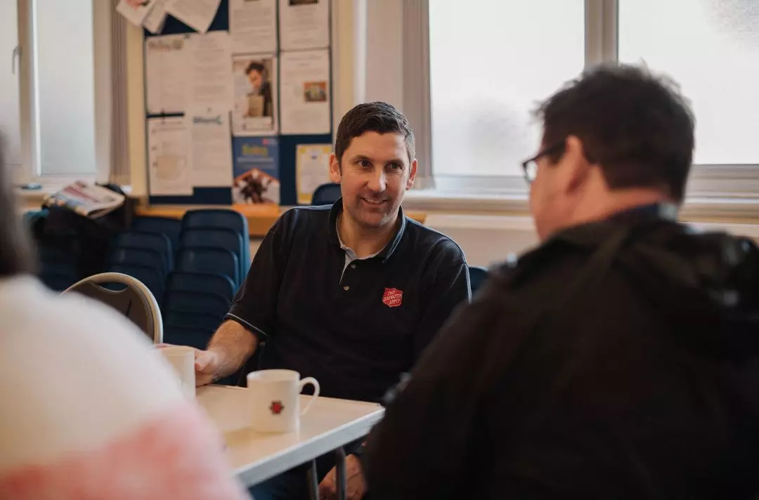A photo of two people chatting at the Bognor Regis open house