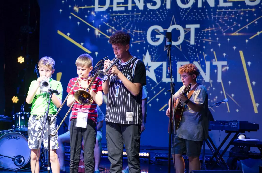 A photo of a talent show at a West Midlands summer school