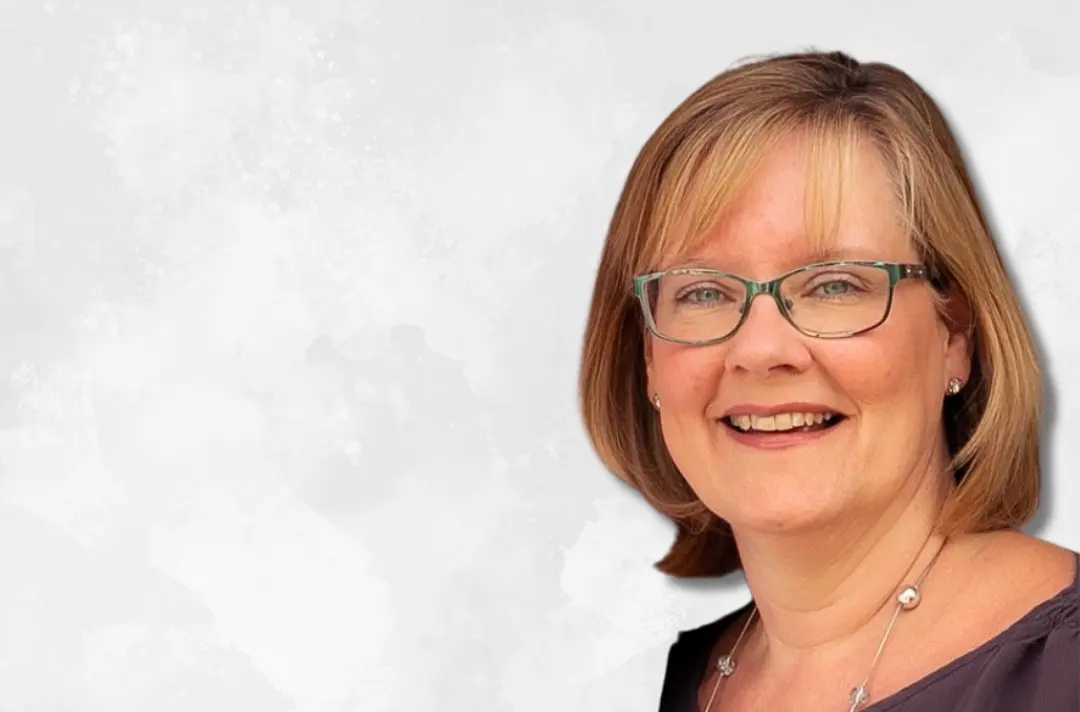 A photo shows Jill Grinsted.