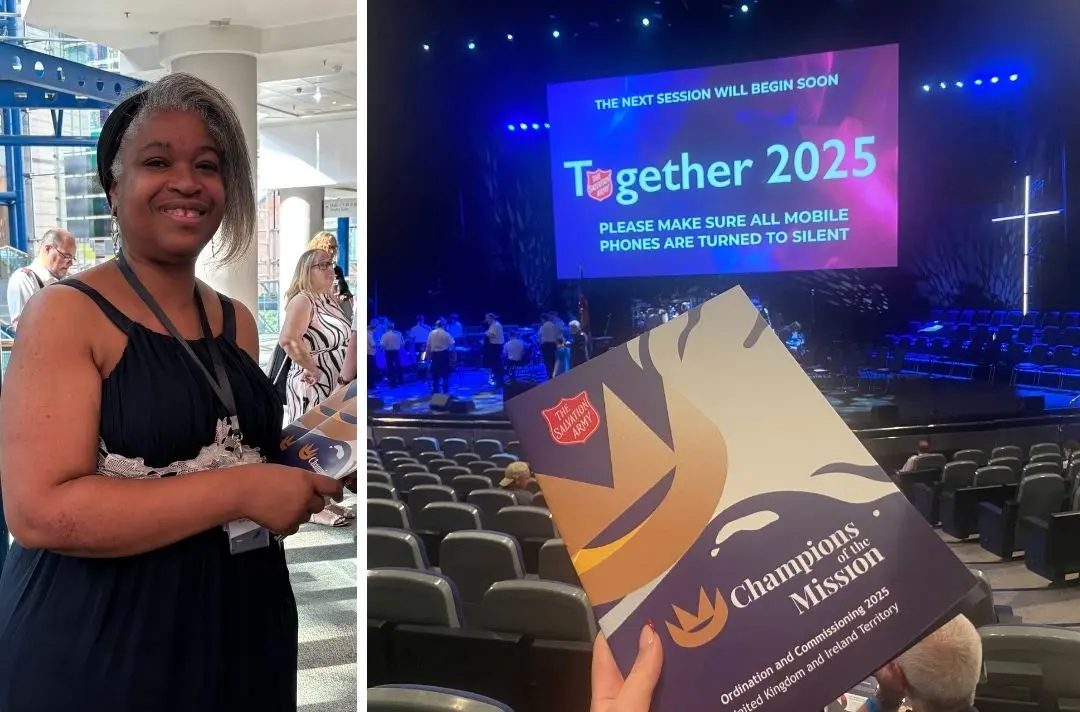 A photo of a woman handing out Commissioning brochures at the ICC before the morning meeting