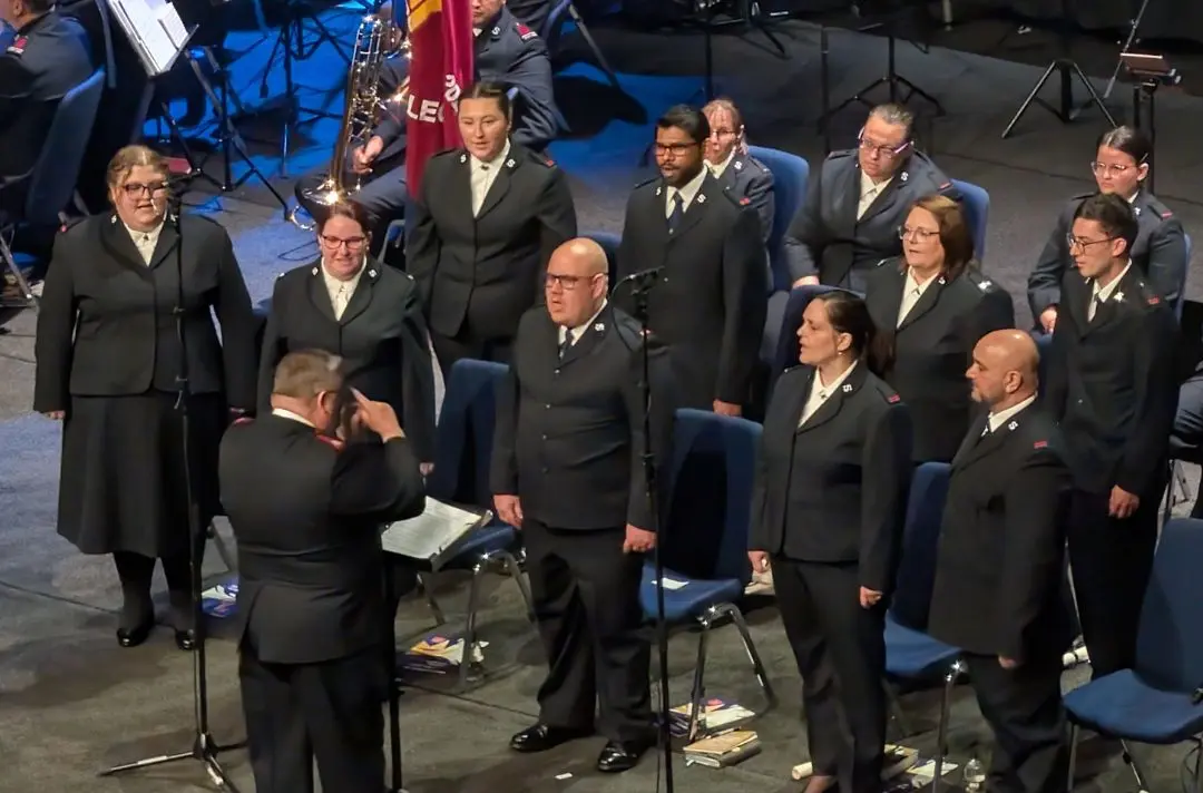 The cadets recite the doctrines of The Salvation Army together on stage