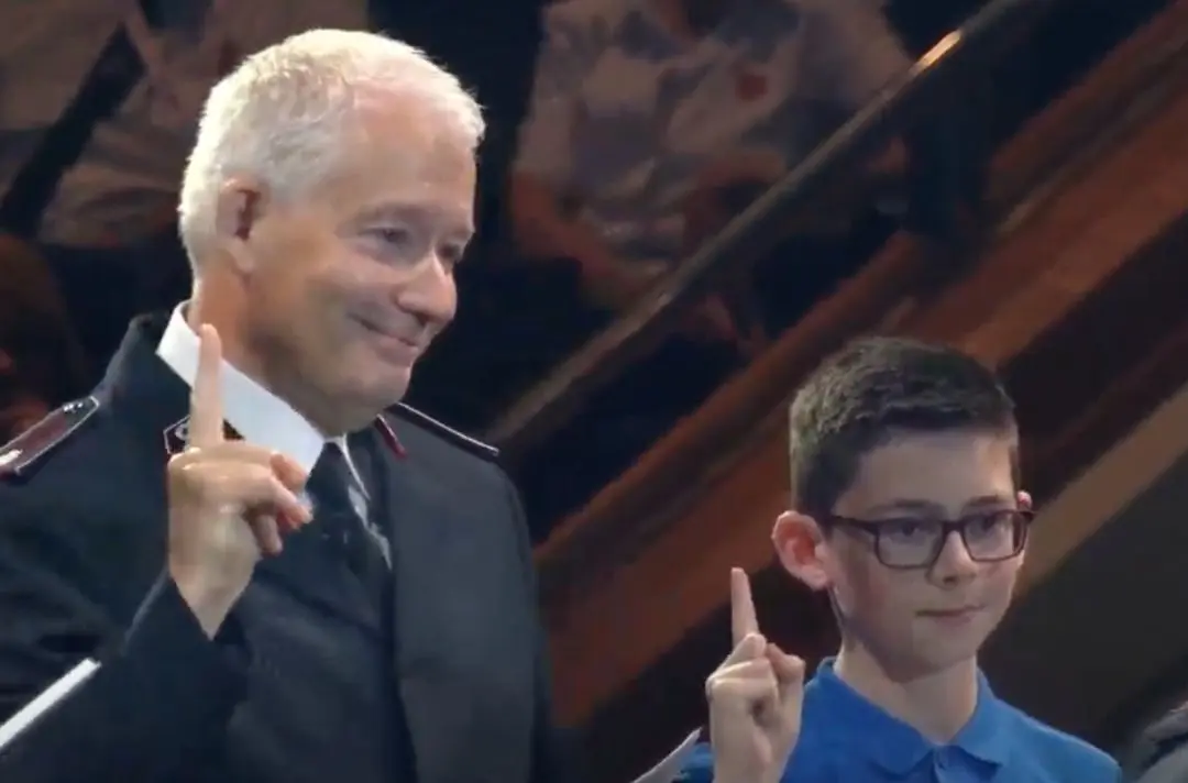 Together 2025, Paul Main and Alfie saluting a new lieutenant on stage