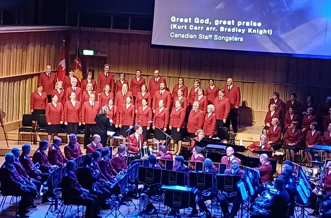 A photo of the Canadian Staff Songsters singing at the Together 2025 music festival