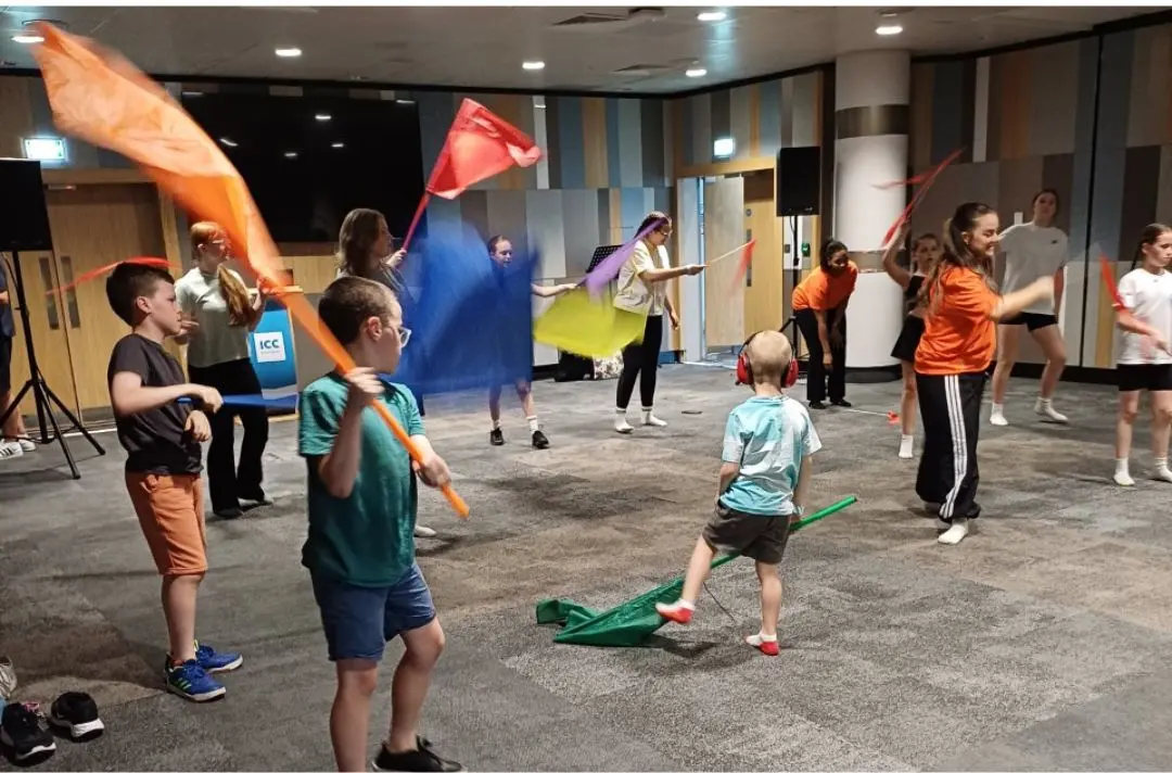 Children dancing with flags