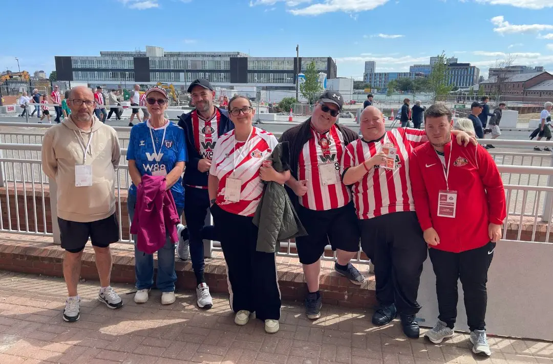 Christine Ritchie (second from left) and other members of the official flag-bearing team