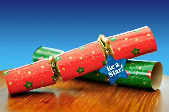 two christmas crackers and a 'be a star' gift tag